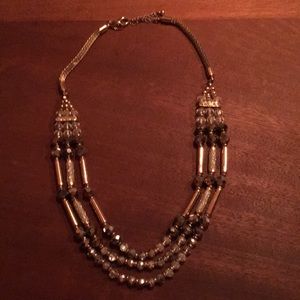 Charming Charlie gold tone beaded necklace with adjustable neckline